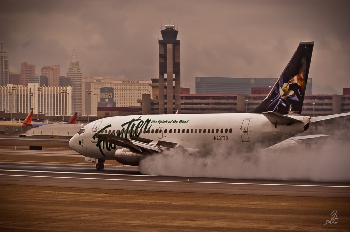 Frontier Airlines Lands in Rain at Las Vegas Airport