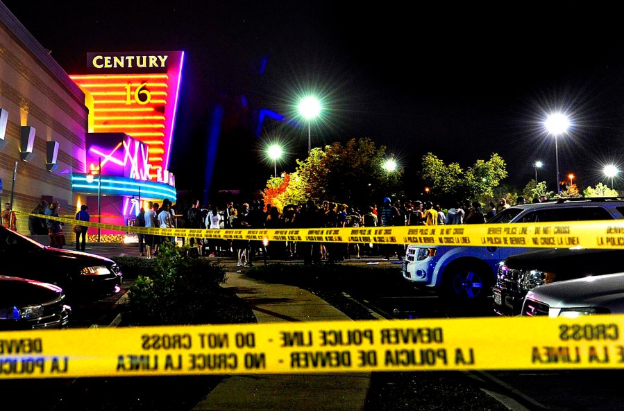 People gather outside the Century 16 movie theater in Aurora, Colorado, at the scene of the mass shooting. (Karl Gehring/Associated Press)