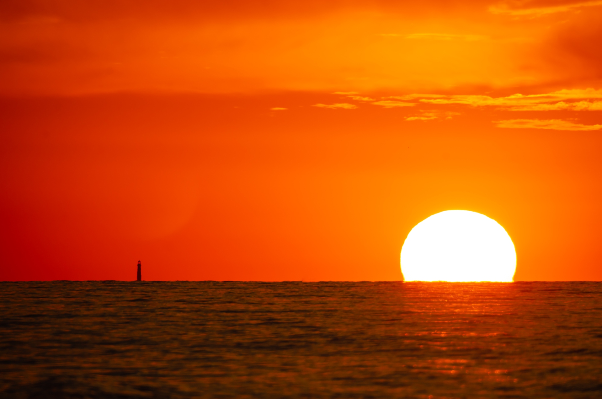 Orange: Lighthouse at Sunset in the Gulf of Mexico